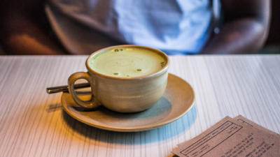 cup of matcha tea on table
